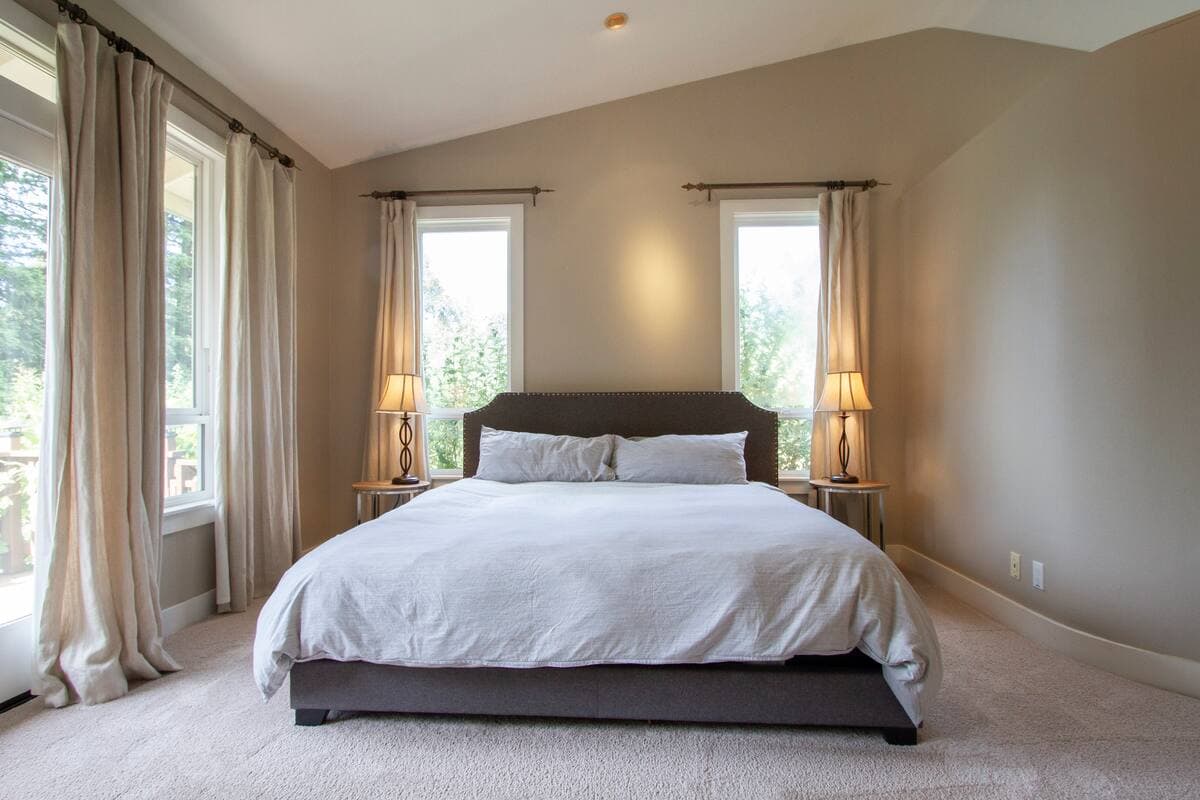 Bedroom with doors opening outside