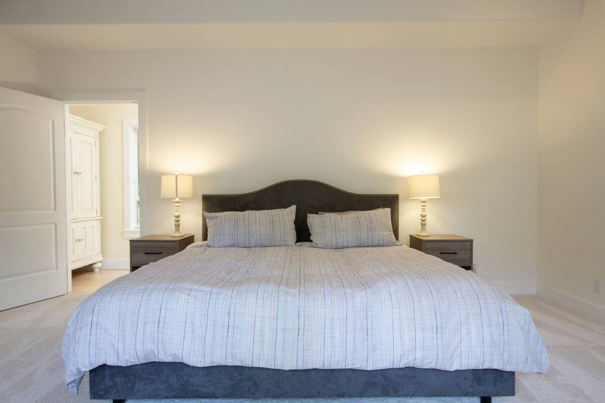 Calm bedroom with dark wood bed