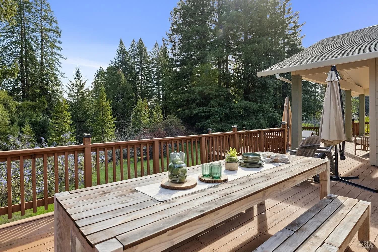 Outdoor dining table on the redwood deck