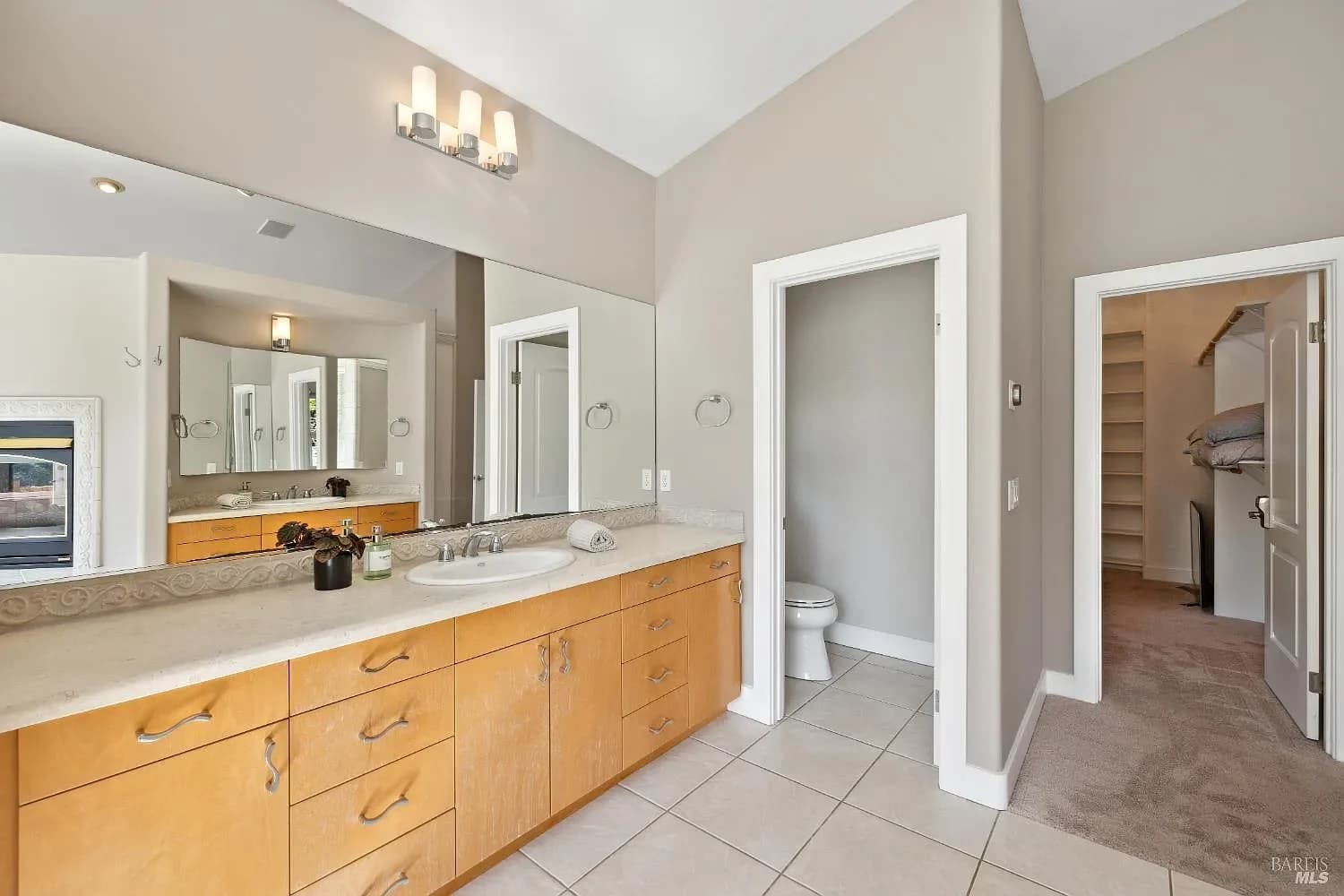 Primary bathroom vanity with dual sinks